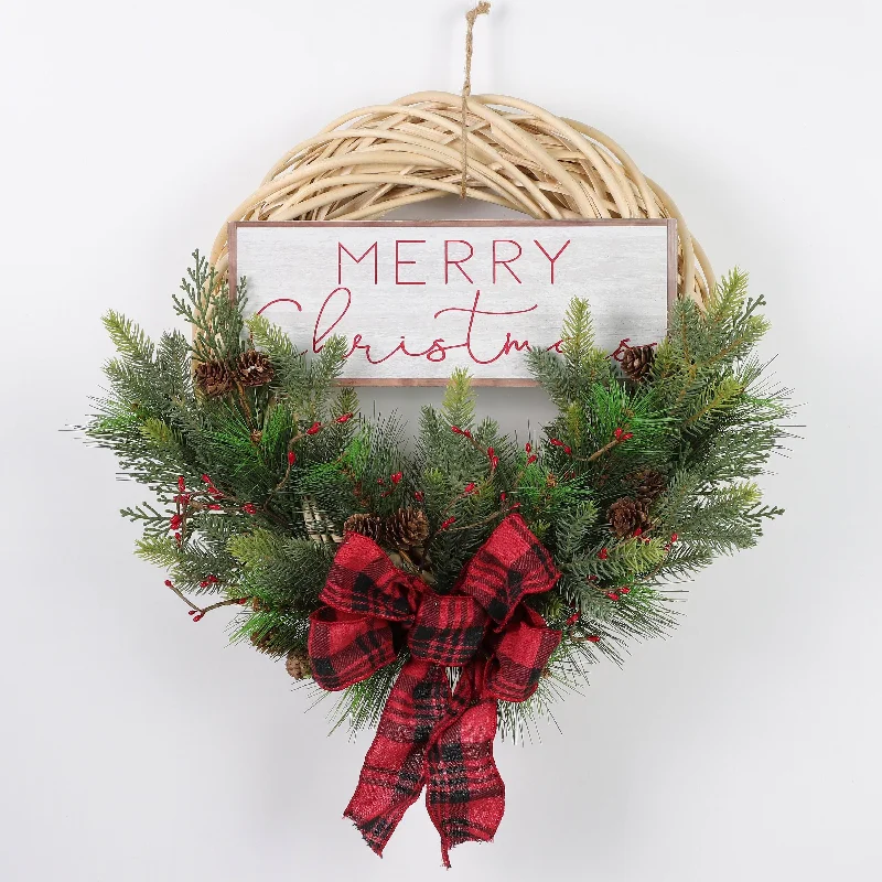 Rattan wreath with ribbons and berries