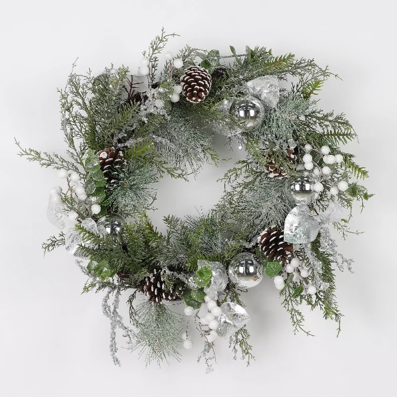 Silver frosted wreath with floral arrangements