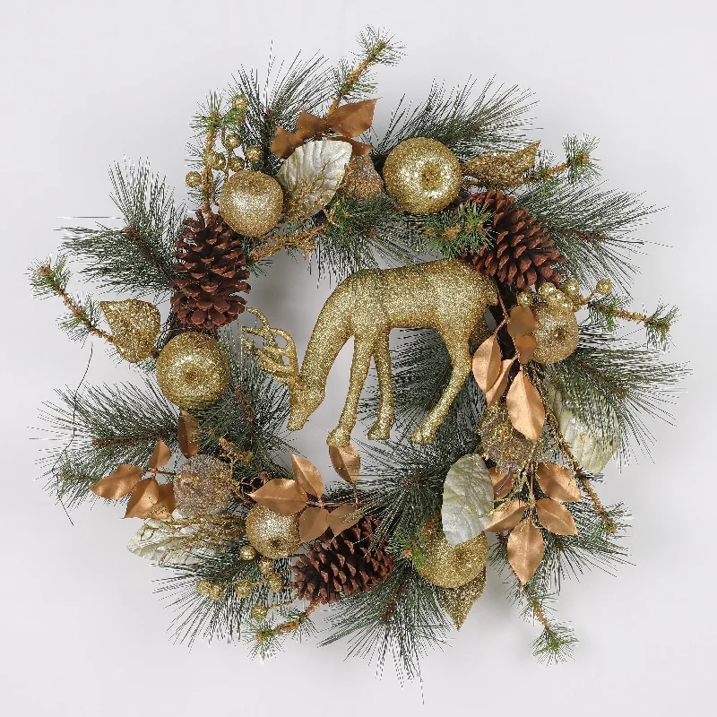 Wreath with golden deer in the middle with golden apples and frosted pinecones