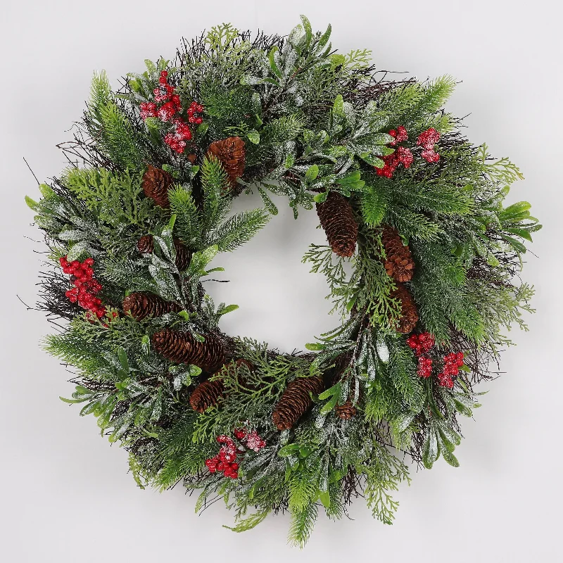 Wreath with frosted berries and pinecones