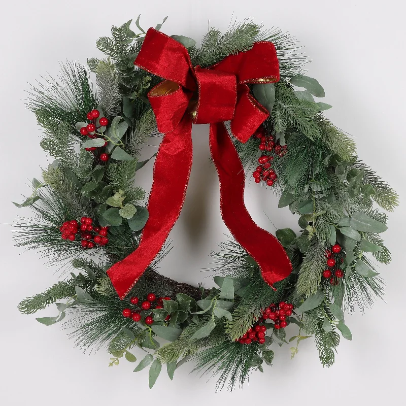 Wreath with large red bow and berries