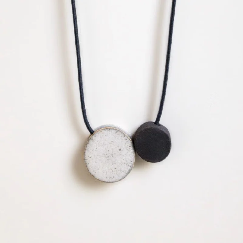 Geo dot gloss and unglossed bead necklace by Janneke