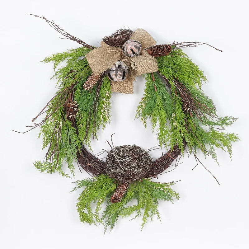 Wreath with jingle bells, white small berries and bird's nest